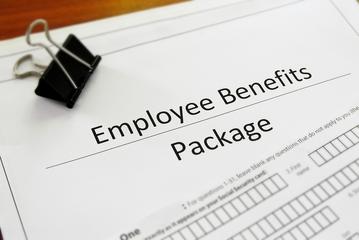 Employee benefits package document with clip.