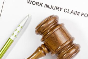 Gavel and work injury claim form.