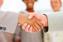 Handshake between two business professionals.